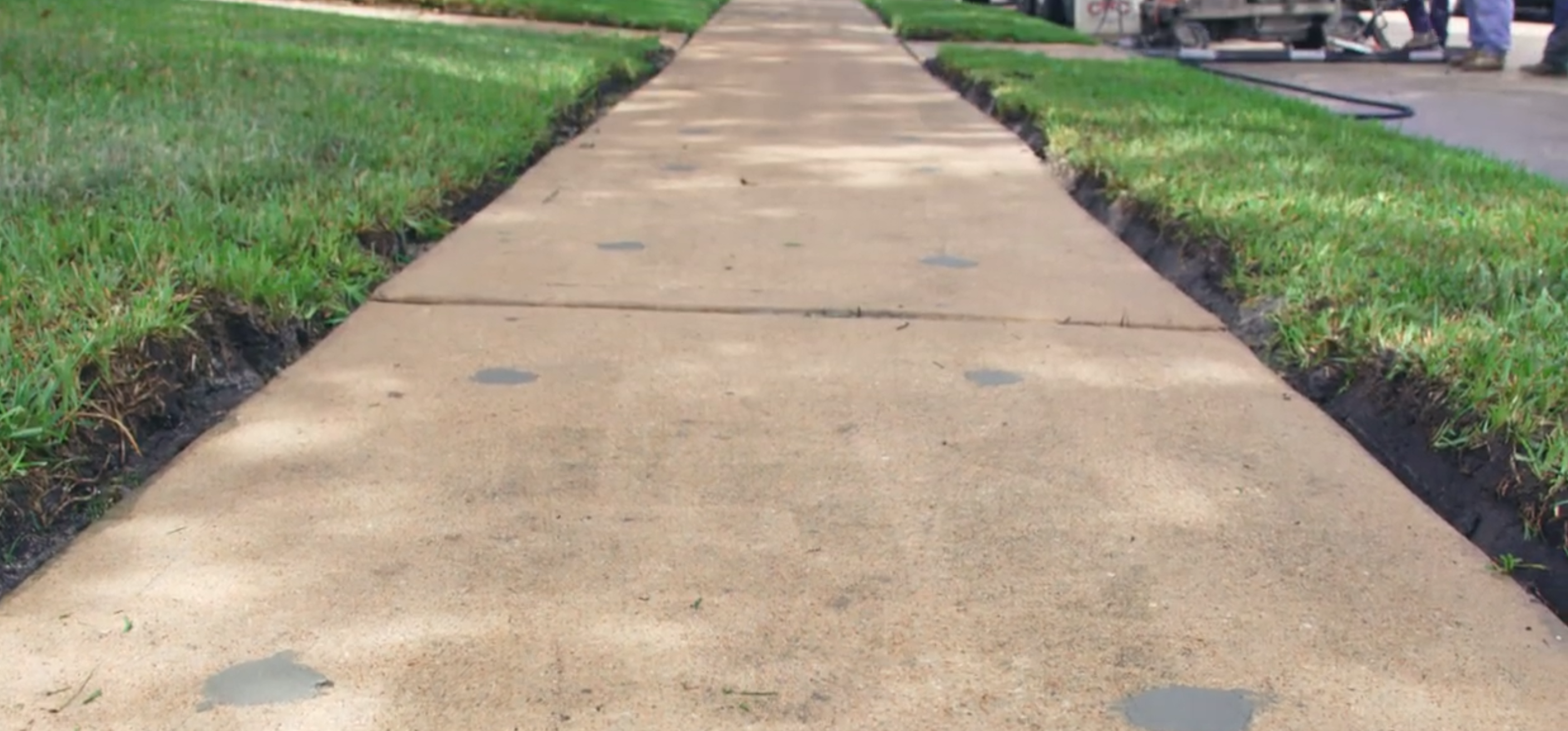 After sidewalk repair - smooth flush surface with no trip hazard