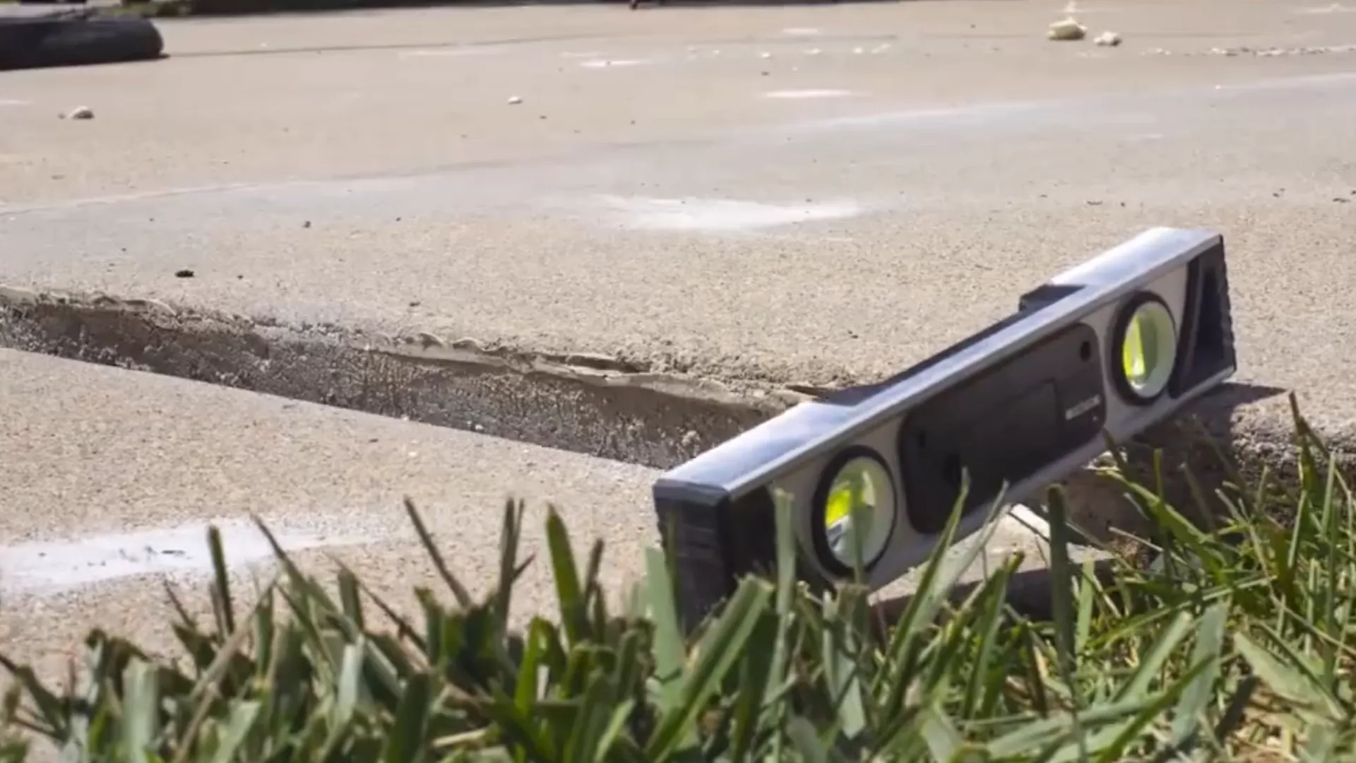Sunken sidewalk section showing settlement and edge height difference