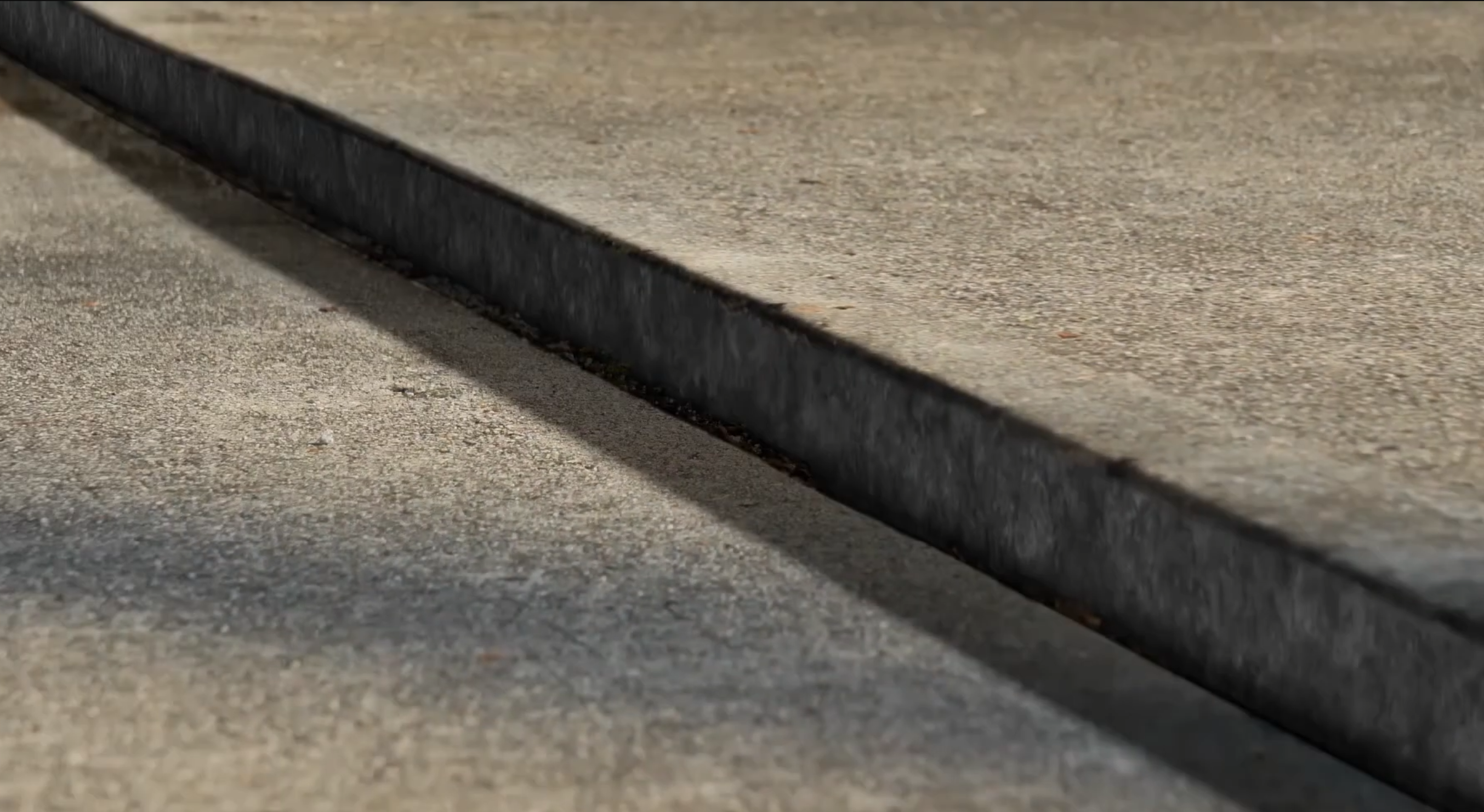 Sunken sidewalk slab repair and leveling
